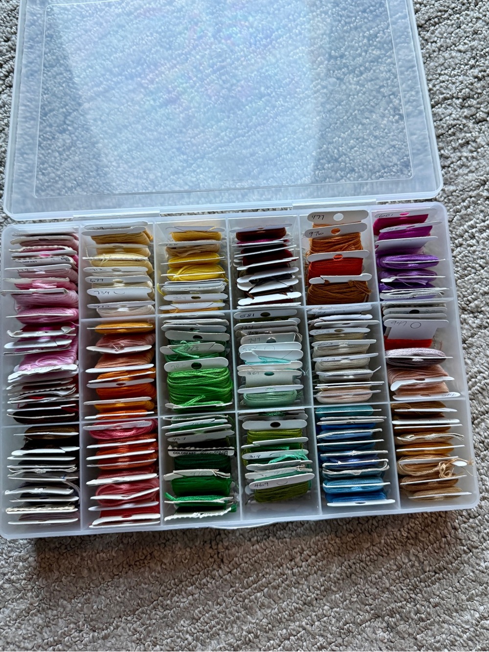 Over 150 Multi-Color Embroidery Floss on tags with Storage container.